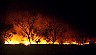 Kakdu national park: bush fire. - Dreamtime Australia: travel photography by Laurenz Bobke.